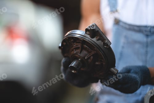 Preview: Vehicle automotive service guy worker doing check or mend car wheel, Asian mechanic repairman