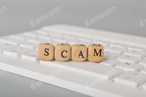 Preview: Computer keyboard and wooden cube SCAM.Fraudulent investment project. Illegal plan to get money