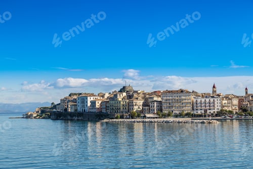 Preview: Corfu island cityscape from the sea with blue waters and sky.