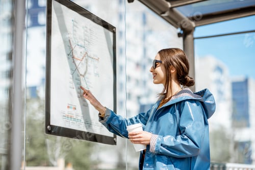 Preview: Woman at the tram station in the city