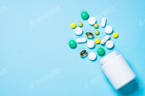 Preview: Pills, tablets and capsules on blue