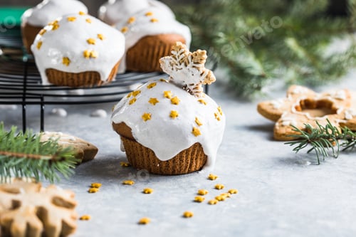 Preview: Christmas cupcakes. Xmas dessert with chocolate drops and marshmallow.