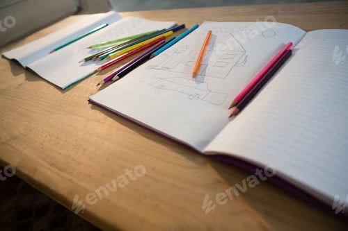 Preview: Books and pencils on a table in the living room