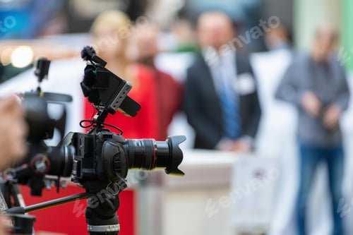 Preview: Cameraman strategically positioned to capture every moment of the opening ceremony with precision
