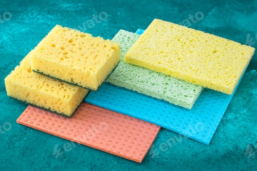 Preview: Kitchen dishcloth, cleanup concept, housework. Colorful kitchen sponges for cleaning