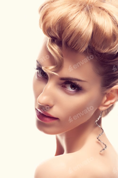 Preview: Fashion natural makeup.Woman with mohawk hairstyle