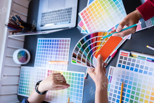 Preview: Group of artists brainstorming planning partnership strategy to coworkers in creative office.