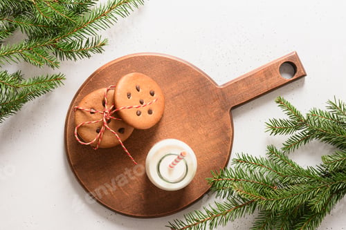 Preview: Milk for Santa Clause and cookies on white table background. View from above.