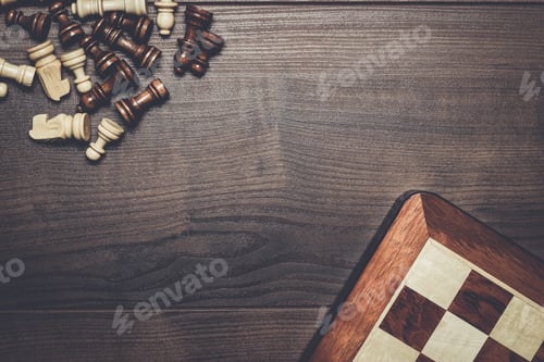 Preview: chess board and figures over woden background