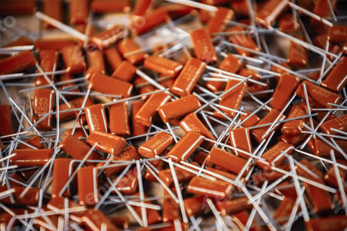 Preview: Close-up of a bunch of red capacitors