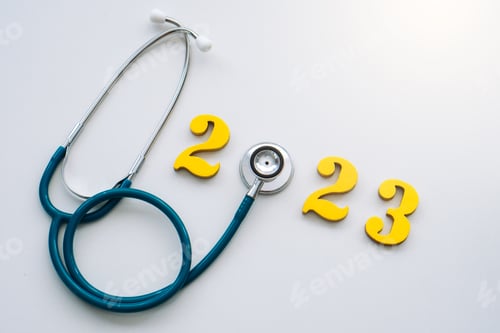 Preview: Stethoscope and numbers 2023.happy new year 2023.White background.copy space.Happy New Year medical.
