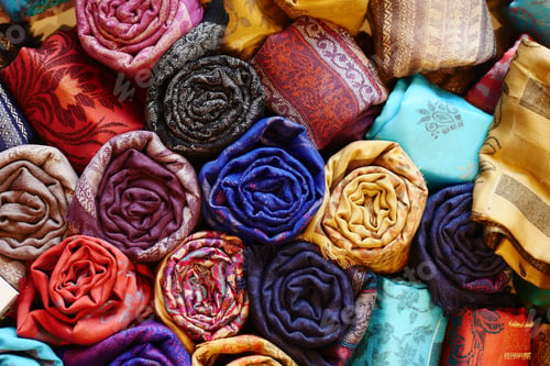 Preview: colorful fabrics, bedspreads and kerchiefs with different oriental patterns.