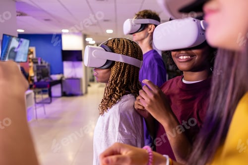 Preview: Gamers using virtual reality headsets in gaming room