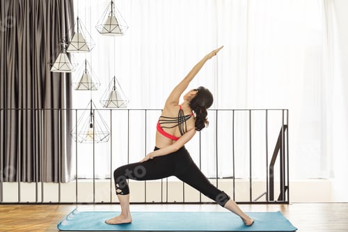 Preview: Asian woman practicing yoga from home when Covid19 outbreak and lockdown