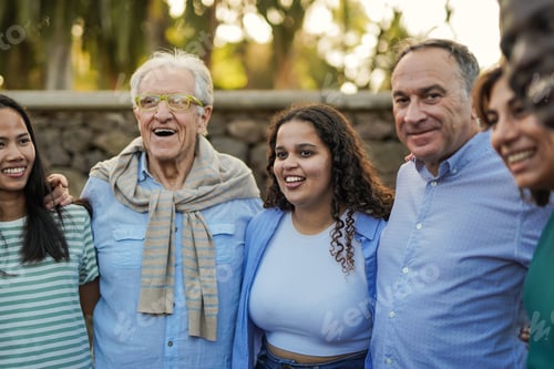 Preview: Group of Friends Laughing Together Outdoors