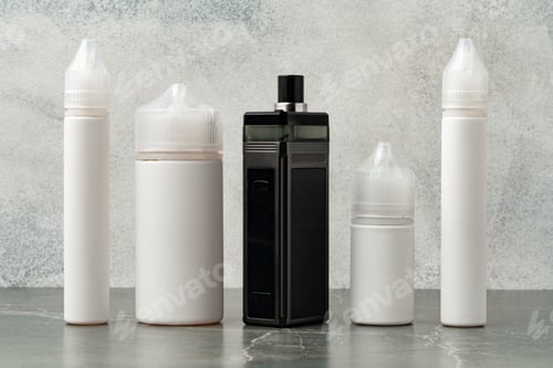 Preview: Electronic cigarette with re-fill liquid bottles on gray background