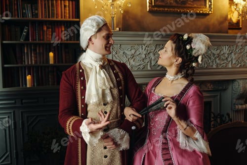 Preview: Caucasian Young Man and Woman Reenacting Baroque Era Scene Indoors