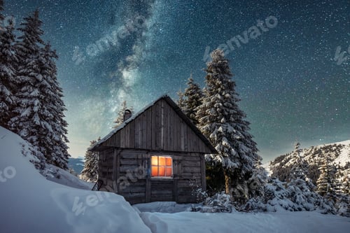 Preview: Fantastic winter landscape with wooden house in snowy mountains