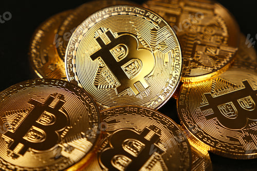 Preview: Gold bitcoin physical coins isolated on black