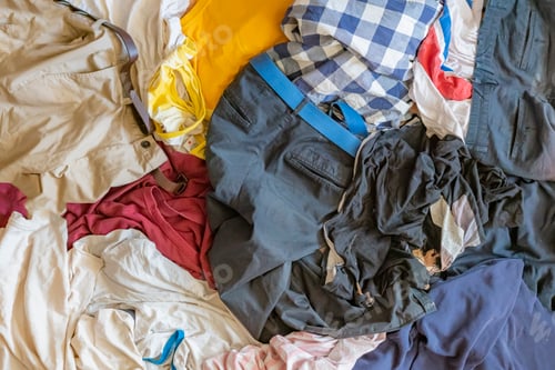 Preview: top view of clothes mess flat lay f