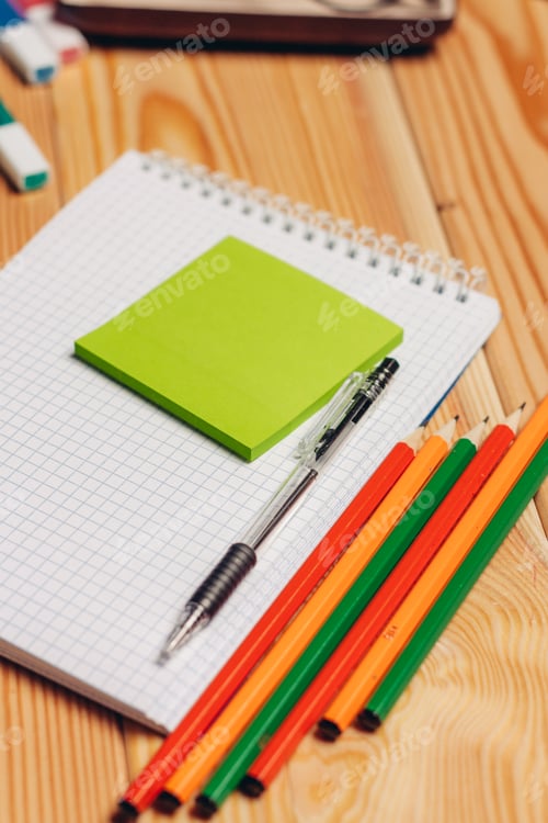Preview: notepads pencils office work paper wood background