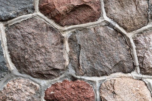 Preview: Masonry stone abstract texture on ancient foundation of cathedral. Old tile pattern.