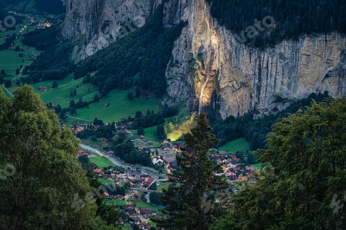 Preview: Beautiful illuminated Lauterbrunnen valley in the dusk at Switzerland