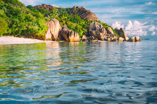 Preview: Unique paradise Anse Source d'Argent beach at La Digue in evening sunset light, Seychelles