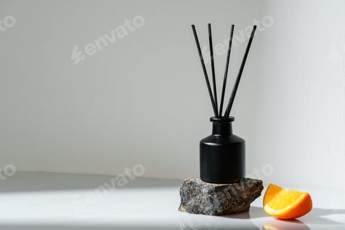 Preview: Aromatic Reed Diffuser on a Stone Base With Orange Slice Accent