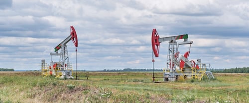 Preview: Two oil rocking chairs in field