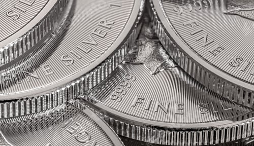 Preview: Grayscale closeup of a stack of silver coins