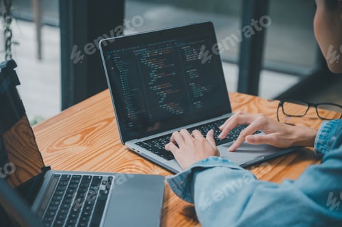 Preview: Female programmer working on coding, software development and web design