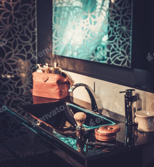 Preview: Gentleman's accessories in a luxury bathroom interior.