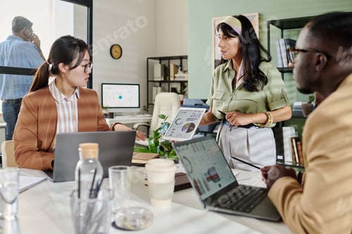 Preview: Discussing Business Strategies in Modern Office Environment