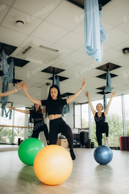 Preview: fitness, sport, training and lifestyle concept - group of smiling women with exercise balls in gym