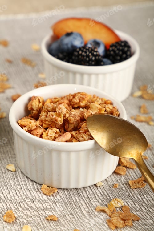 Preview: Portion of muesli granola breakfast with yogurt