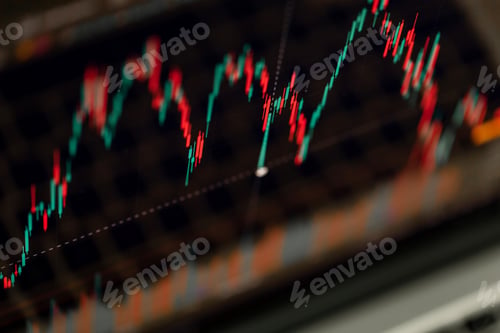 Preview: Trading chart displayed on the screen of the laptop. Stock market, trend line in a candlestick form.