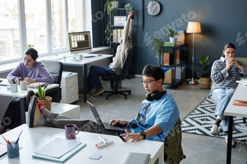 Preview: Diverse People Working in Open Office