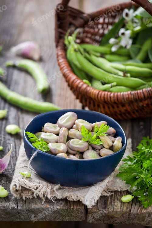 Preview: Closeup of tasty broad beans on old wooden table