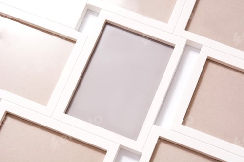 Preview: White photo frames creating a modern and stylish collage displaying artwork