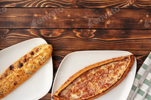 Preview: Pide - Turkish baked bread on wooden table