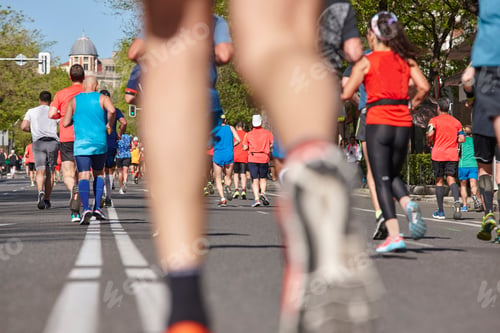 Preview: Marathon runners on the street. Healthy lifestyle. Urban athletes