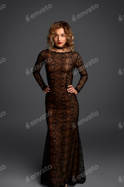 Preview: Young woman in elegant evening dress