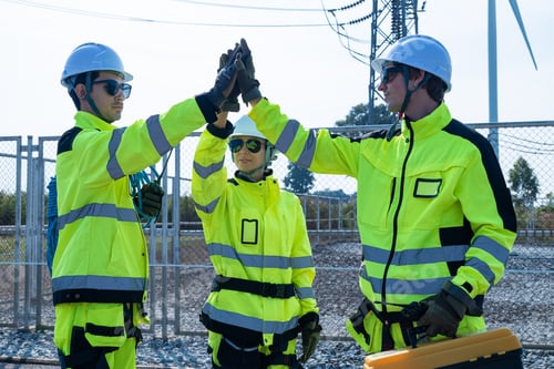 Preview: Engineers high-fiving at power station