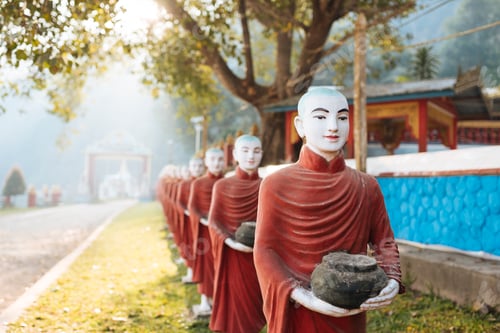 Preview: Row of buddhist monk statues holding ban bats, Kaw Ka Thawng Cave, Hpa An, Kayin State, Myanmar