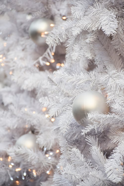 Preview: White decorations on white Christmas tree with copy space