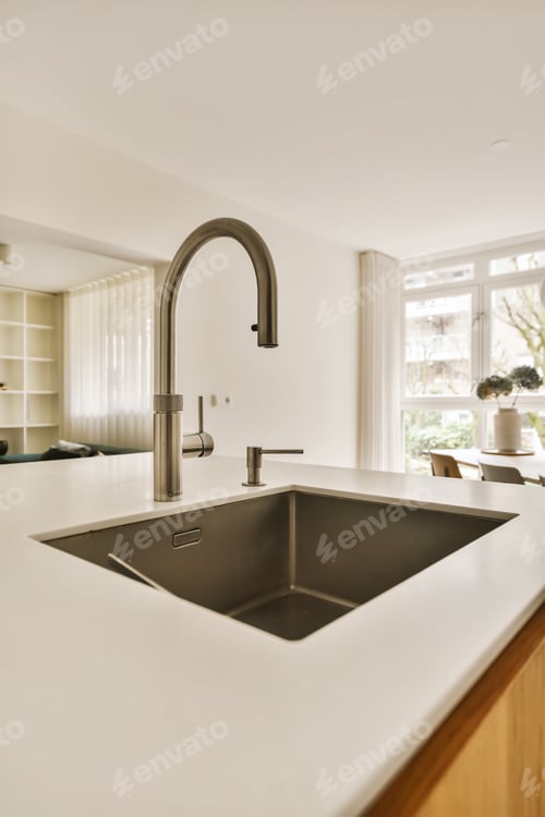 Preview: a kitchen with a sink and a faucet