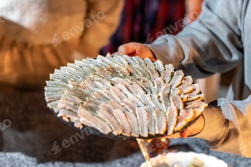 Preview: Pieces of meat on a plate on the table, family dinner concept.