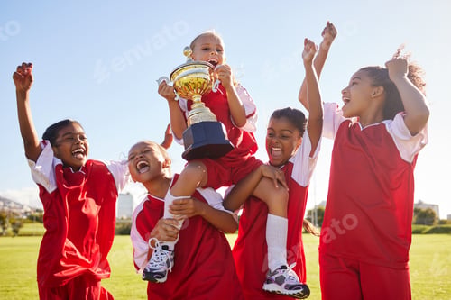 Preview: Soccer, team and trophy with children in celebration together as a girl winner group for a sports c
