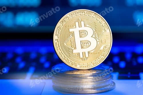 Preview: Golden and silver bitcoins on chart. Finance trading